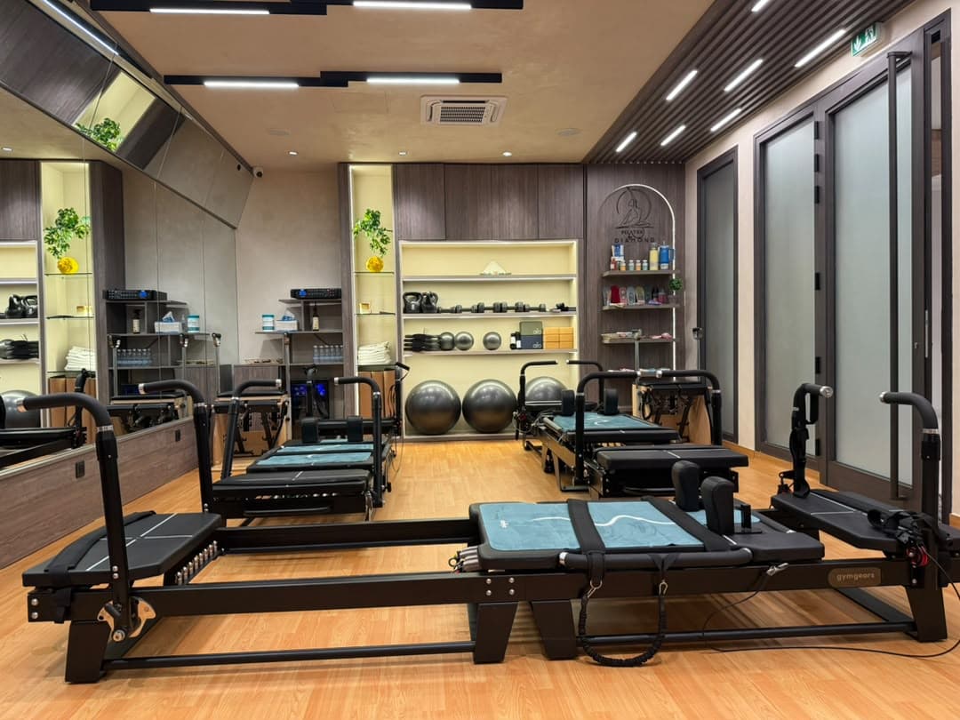 Salle de Diamond Pilates : appareils Reformer et accessoires